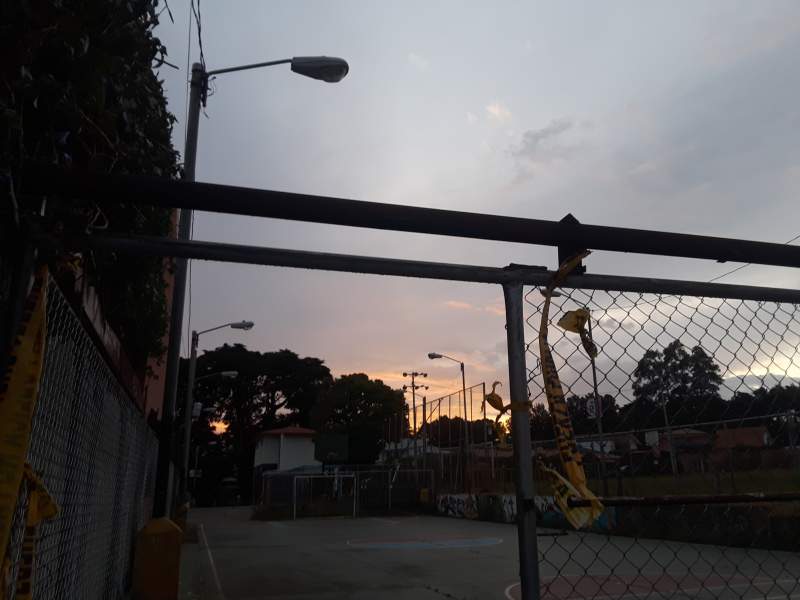 Sunset above basketball court