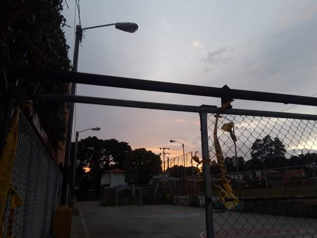 Sunset above basketball court